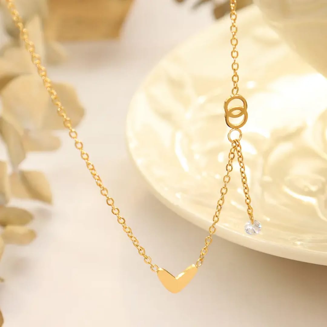 Love Heart Ring Tassel Pendant - Necklace, Tarnish Free necklace by the leather jewel.