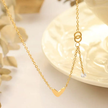 Love Heart Ring Tassel Pendant - Necklace, Tarnish Free necklace by the leather jewel.
